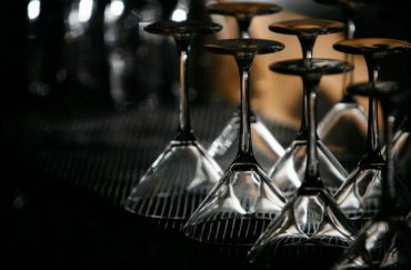 Photo of upturned cocktail glasses