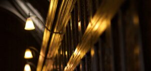 Lights above the bookcases in Chetham's Library