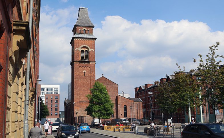 Image of Halle St Peters from across Cutting Room Square in Ancoats, Manchester.