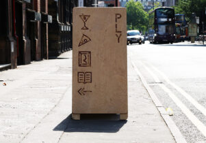 Image of signage outside PLY in Manchester's Northern Quarter