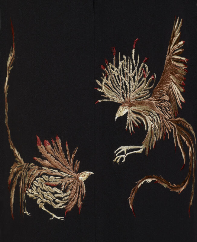 A McQueen coat of 1998 with dramatic embroidery showing a pair of fighting cocks Photographs Courtesy Kerry Taylor Auctions