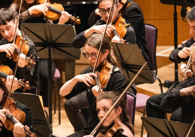 Students playing in an orchestra