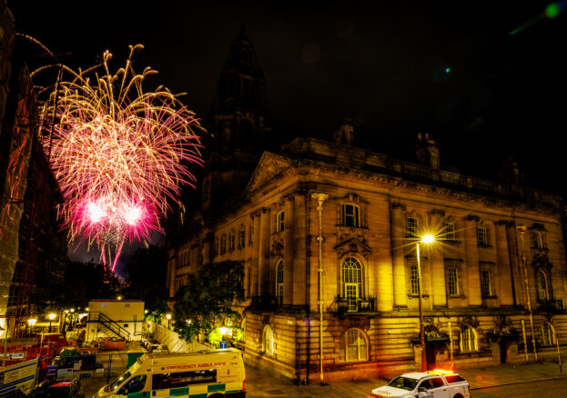 Fireworks above Sessions House at night.