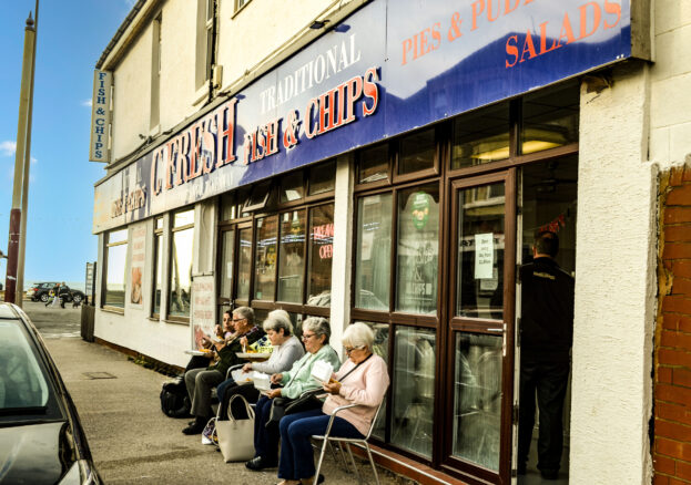 Ladies eating Fish and Chips 