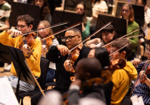 students playing in a symphony