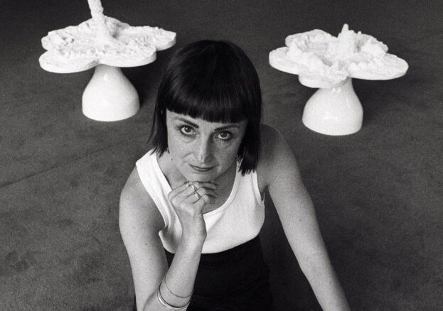 Helen Chadwick posing with a sculpture called Piss Flowers taken during the exhibition Helen Chadwick: Effluvia, held at the Serpentine Gallery, London, in 1994