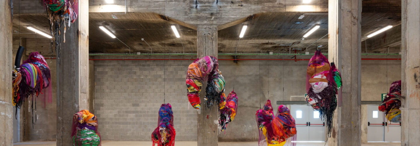 Nnena Kalu, Hanging Sculpture 1-10, installation, 2024; photo courtesy of Manifesta 15 Barcelona Metropolitana. Photo credit: Ivan Erofeev.