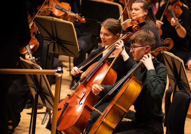 Students playing in orchestra