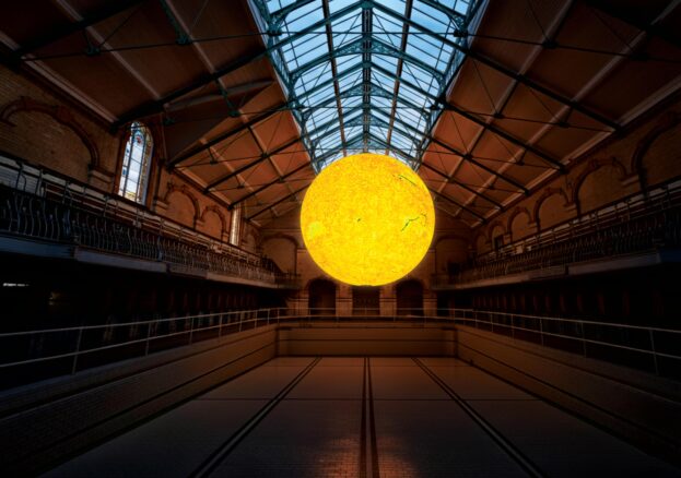 Large Sun sculpture suspended over an Edwardian swimming pool