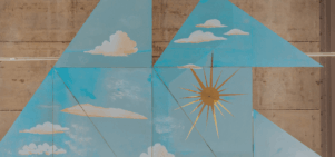Blue triangles with white clouds on them against a beige backdrop. A gold sun is in the middle.